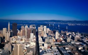 Aerial view of San Frnacisco downtown with the Bay Bridge in the background